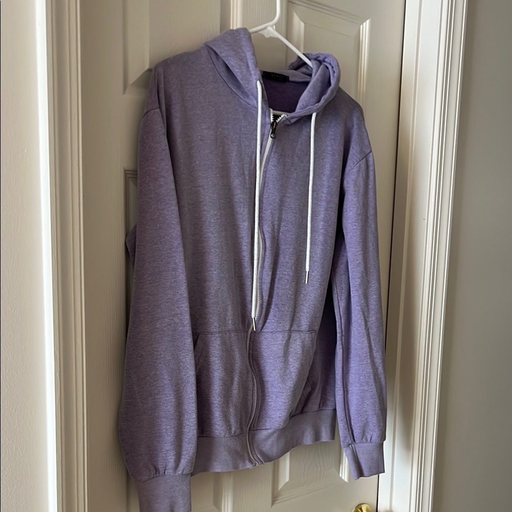 Purple Women’s Zipup Hoodie with front pockets and white drawstrings